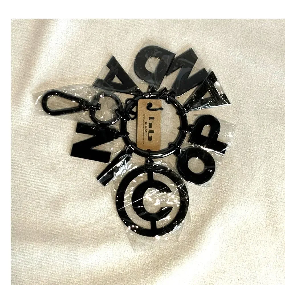 NWT NICOPANDA Letters Black Metal Keychain